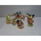 A COLLECTION OF SEVEN ROYAL WORCESTER BIRDS