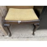 A MAHOGANY STOOL ON CABRIOLE SUPPORTS