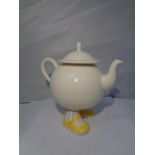 A CARLTON WARE TEAPOT WITH FEET