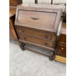 AN EARLY 20TH CENTURY OAK BUREAU, 30" WIDE