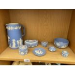 A GROUP OF EIGHT WEDGWOOD JASPERWARE ITEMS TO INCLUDE A JUG, FOUR TRINKET DISHES AND A BOWL ETC