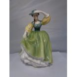 A ROYAL DOULTON 'BUTTERCUP' FIGURINE