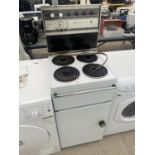 A WHITE FREESTANDING BELLING OVEN AND HOB