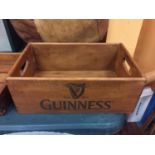 A WOODEN GUINESS ADVERTISING BOX 35CM X 23CM