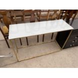 A MODERN BRASS FRAMED CONSOLE TABLE WITH GLASS TOP, 47" X 16"