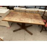 A MID 20TH CENTURY BEECH FUNCTION TABLE ON PLATFORM BASE, 57" X 33"