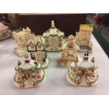 A COLLECTION OF SEVEN COALPORT MINIATURE HOUSES