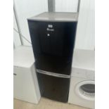 A BLACK SWAN UPRIGHT FRIDGE FREEZER