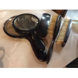A COLLECTION OF DRESSING TABLE ITEMS TO INCLUDE MIRRORS AND BRUSHES