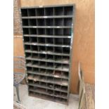 A VINTAGE 72 SECTION PIGEON HOLE STORAGE UNIT