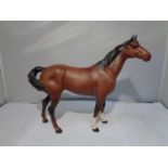 A BESWICK SWISH TAILED HORSE