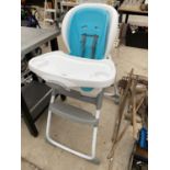 AN INGENUITY CHILDRENS HIGH CHAIR