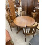 A MODERN CIRCULAR DINING TABLE, 42.5" DIAMETER, AND FOUR MATCHING CHAIRS