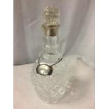 A HOBNAIL CUT GLASS HALLMARKED LONDON SILVER DECANTER