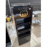 A GUCCI SHOP STAND