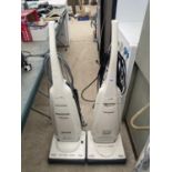 A WHITE PANASONIC LIGHTWEIGHT 1900W VACUUM CLEANER AND A FURTHER PANASONIC LIGHTWEIGHT 1600W