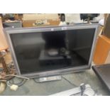 A SILVER 32" PANASONIC VIERA TELEVISION WITH REMOTE CONTROL