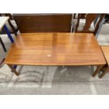A RETRO TEAK COFFEE TABLE BEARING STAMP 'MADE IN DENMARK BY A.B.J.', 54" X 27.5"