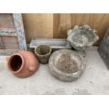 AN ASSORTMENT OF GARDEN PLANTERS TO INCLUDE A STONE EFFECT URN, STONE EFFECT TROUGH ETC