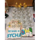 VINTAGE BABYCHAM COLLECTABLES TO INCLUDE TWENTY COUPE GLASSES, TWO TEA TOWELS, TWO LARGE DRIP MATS