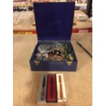A BOX OF COSTUME JEWELLERY AND THREE BOXED PENS