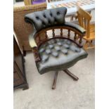A REPRODUCTION BUTTON BACK SWIVEL OFFICE CHAIR