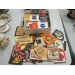 A LARGE COLLECTION OF BEER MATS TO INCLUDE FOSTERS, CALSBERG, STRONGBOW AND GOLD LABEL