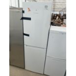 A WHITE BOSCH UPRIGHT FRIDGE FREEZER