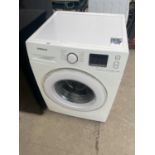 A WHITE SAMSUNG WASHING MACHINE BELIEVED IN WORKING ORDER BUT NO WARRANTY