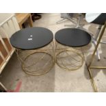 A PAIR OF WIREWORK LAMP TABLES WITH BLACK TOPS, 18" DIAMETER