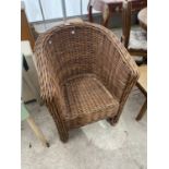 A MODERN HIGH BACK WICKER TUB TYPE CHAIR