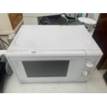 A WHITE SAINSBURYS MICROWAVE OVEN