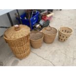 A WICKER LAUNDRY BASKET AND THREE FURTHER WICKER BASKETS