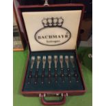 A BACHMAYR SOLINGEN BOXED SET OF STEAK KNIVES AND FORKS