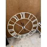 A LARGE VINTAGE METAL WALL CLOCK