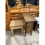 A RETRO DROP-LEAF DINING TABLE AND NEST OF TWO TABLES