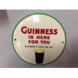 A SMALL CIRCULAR ENAMEL GUINNESS ADVERTISING SIGN DIA:15CM