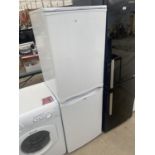 A WHITE HOTPOINT ICED DIAMOND UPRIGHT FRIDGE FREEZER