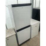 A WHITE HOTPOINT UPRIGHT FRIDGE FREEZER