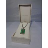 A SILVER CHAIN NECKLACE AND JADE PENDANT