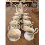 A RICHMOND 'BLUE POPPY' TEA/COFFEE SET COMPRISING TEA/COFFEE POT, SIX CUPS AND SAUCERS, MILK/CREAM