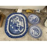 A LARGE BLUE AND WHITE CERAMIC MEAT PLATE AND FURTHER BLUE AND WHITE DINNER PLATES