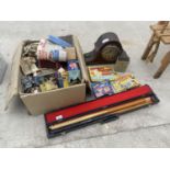 AN ASSORTMENT OF ITEMS TO INCLUDE A SNOOKER CUE, VINTAGE JIGSAWS AND A MANTLE CLOCK ETC