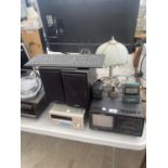 AN ASSORTMENT OF ITEMS TO INCLUDE A PORTABLE COLOUR TELEVISION AND SPEAKERS ETC