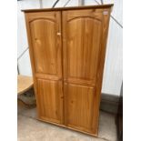 A MODERN PINE TWO DOOR WARDROBE, 43" WIDE