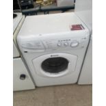 A WHITE HOTPOINT WASHER DRYER