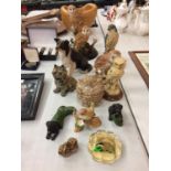 A NUMBER OF ANIMAL FIGURES TO INCLUDE OWLS AND A BADGER PAPERWEIGHT