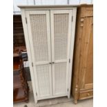 A MODERN TWO DOOR WARDROBE WITH RATTAN DOORS, 32" WIDE