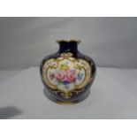 A ROYAL CROWN DERBY VASE