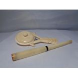 TWO ITEMS OF BONE TO INCLUDE A RATTLE AND A CHEROOT HOLDER